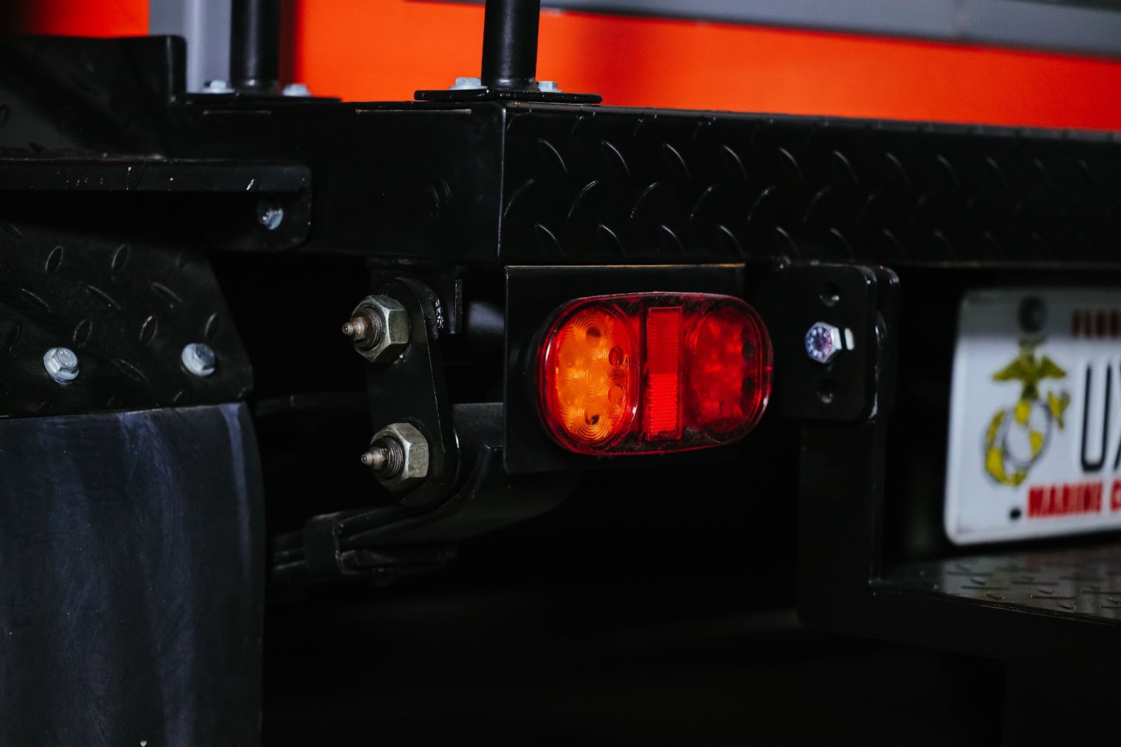 Traffic signal lighting system for the mobile restroom when placed on the roadside